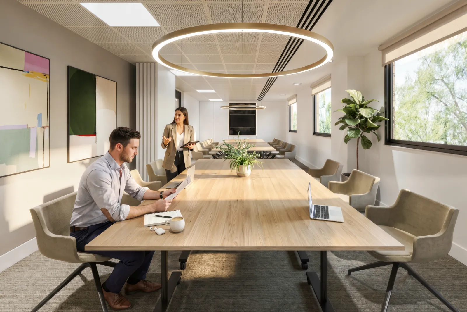The same meeting room after the 100CGI upgrade: daylight, real materials and people