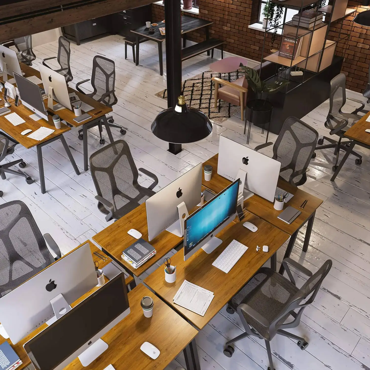 Top-down view of a modern open office workspace with wooden desks, computers, and ergonomic chairs.