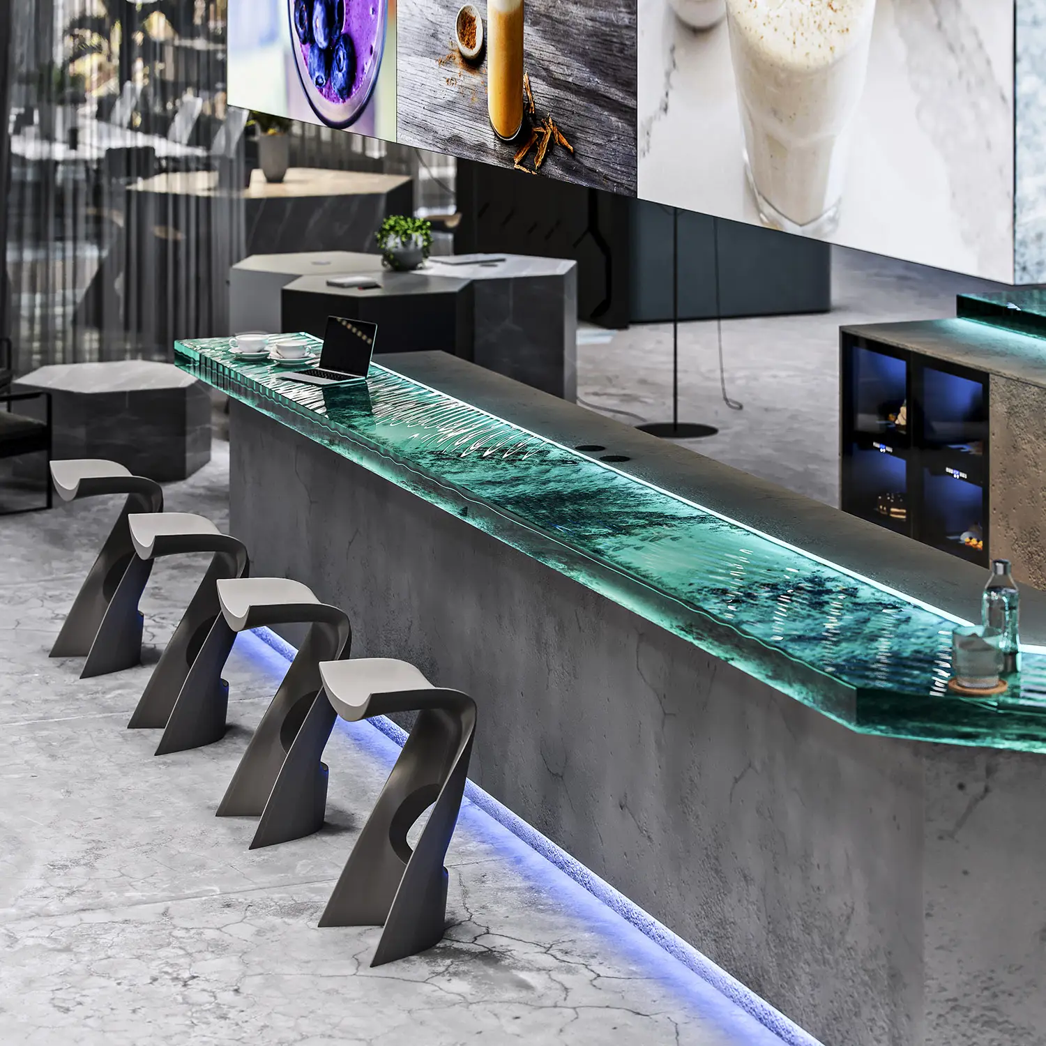 Render of a sleek, futuristic bar featuring a glass countertop, modern stools, and large digital screens.